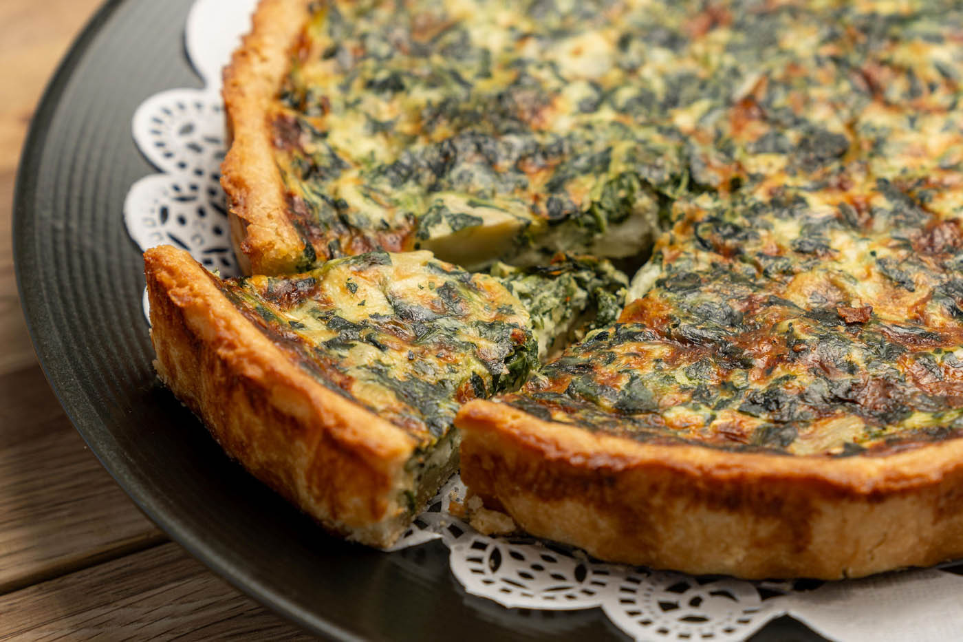 Quiche on a white plate at The Real Food Academy Tampa.