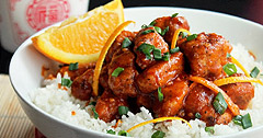 The Real Food Academy Tampa orange peel chicken on white rice with vegtables.