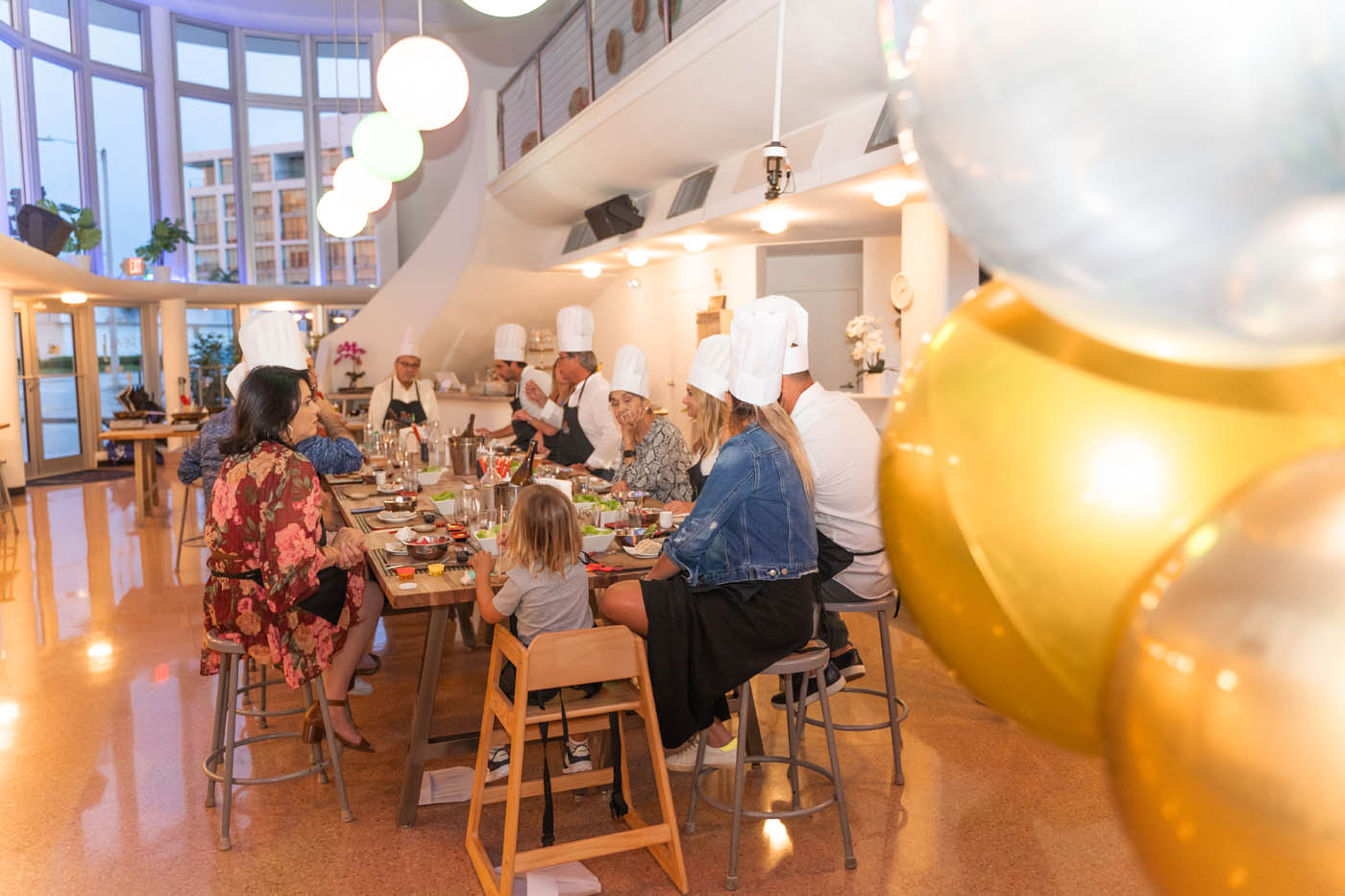A family at The Real Food Academy's cooking party, we are one of the top birthday party places in Tampa, FL. 