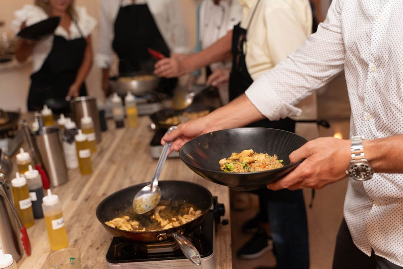 A group of adults at a The Real Food Academy birthday party.