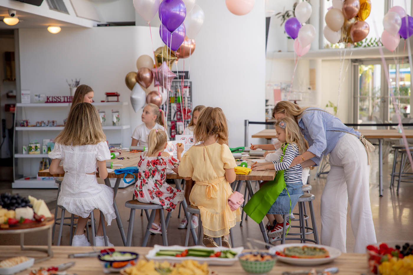 A picture of The Real Food Academy Tampa's kids birthday party place, an indoor venue with tall windows.