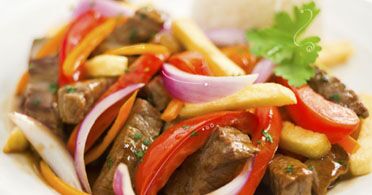 The Real Food Academy Orlando lomo saltado course.